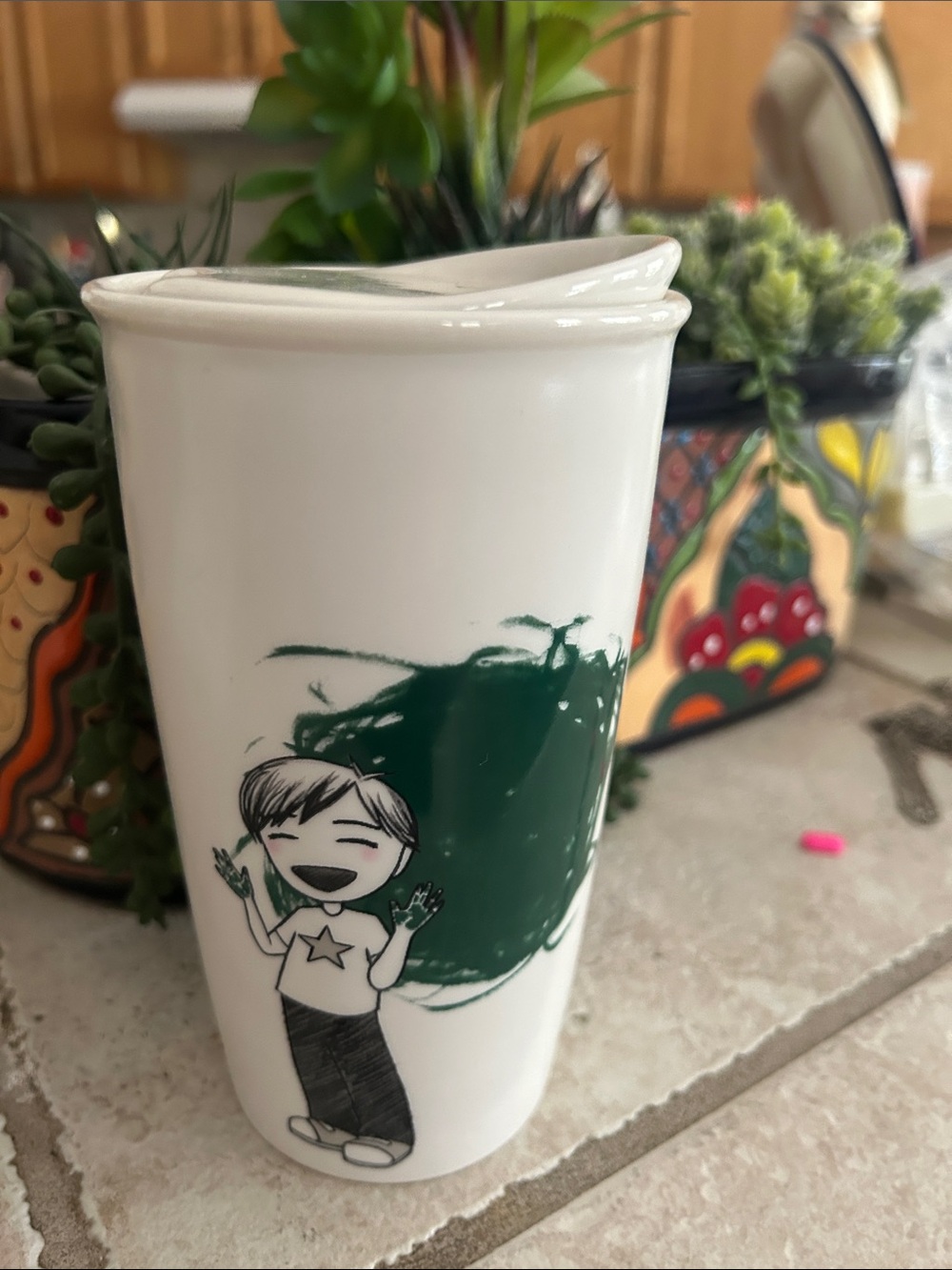 Starbucks White Ceramic Tumbler with Green Accent and Character Graphic